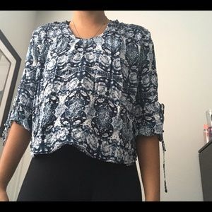 3/4 sleeved flowy wide neck top